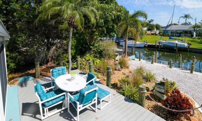 Bayshore Gardens House | CANAL FRONT W/DOCK, Water View, Dock your Boat, Free WIFI Dog - See Note.