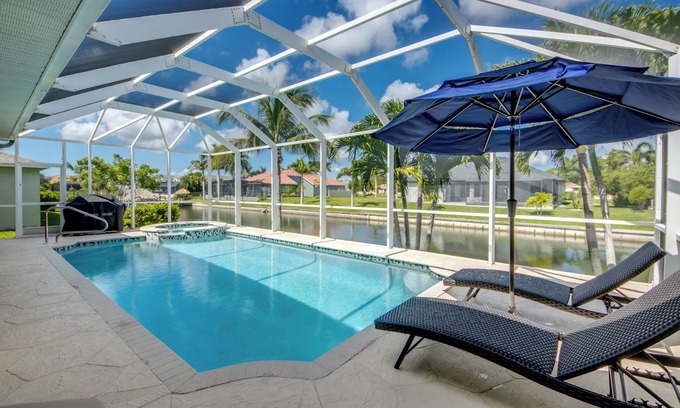 Pelican Villa | Capacious 4 BR/3 bath waterfront Villa with heated pool, spa, kayaks and bikes