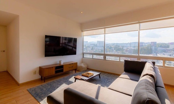El Yaqui Condo | Capitalia - Chic Renovated w/Garden
