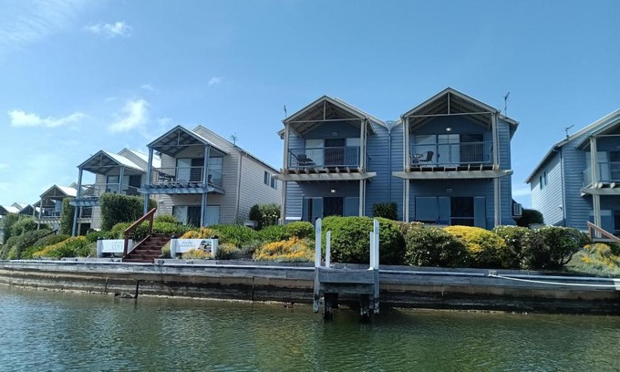 Paynesville Apartment | Captains Cove Resort - Waterfront Apartments