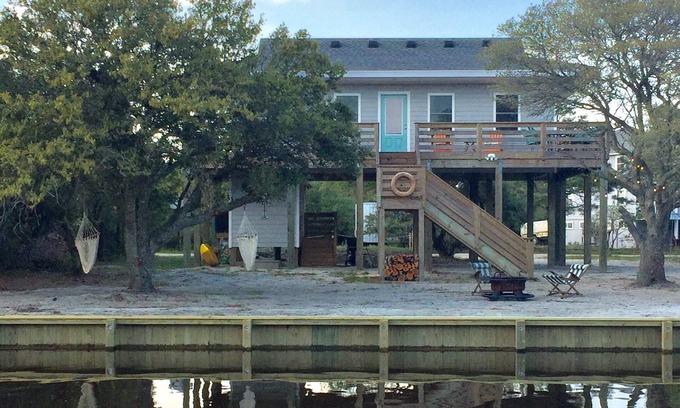 Carova Beach Cottage | Carova Beach Canal Front Cottage 4x4 required Beach Parking Pass provided