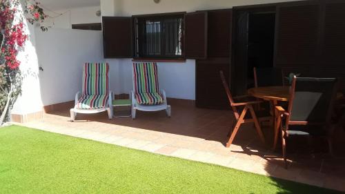 Mar de Pulpi Apartment | Casa ARCO IRIS avec Jardin et Terrasse - piscine et jacuzzi partagés - by Cathy Ducoin
