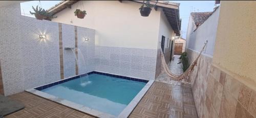 Itanhaem House | Casa com piscina e praia logo ali
