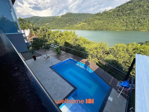 South Region House | Casa em Chapeco com Piscina Privativa e Vista Lago