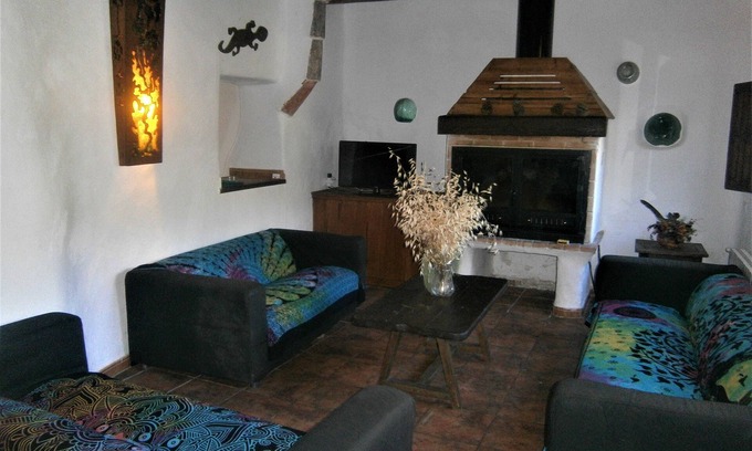 Majada Carrasca Cottage | Casa Los Gatos 1 to 13 people. 4 bedrooms with bathroom, living room with fireplace, heating.