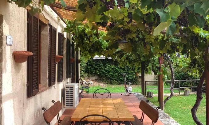 Capalbio Apartment | Casa Terra - private garden, parking, privacy and view