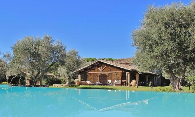Capalbio Villa | Casale degli Ulivi is a stylish Tuscan house with infinity pool and splendid park, located in Ca...