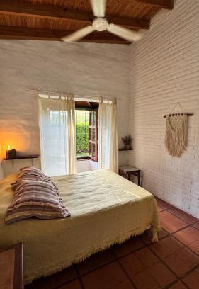 Las Rosas House | Casita cercana a plaza de Villa de las Rosas con patio y asador
