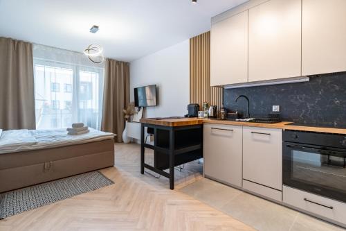 Katowice Apartment | Ceglana Modena Park Apartment by BookingHost