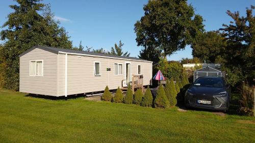 Kropswolde Apartment | Chalet Meerwijck mit Terrasse am Wasser und Meer mit Schwimmbad