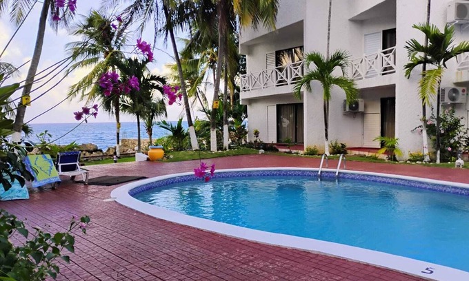 Ocho Rios Apartment | Charming 1-bedroom in Tower Isle St Mary: AC, WiFi, pool, and a serene retreat.
