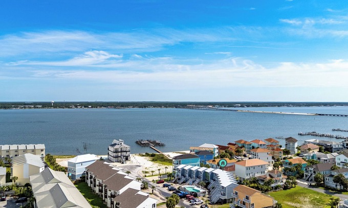 Navarre Beach House | Charming 1-BR townhome on Navarre Beach with pool, AC, kitchen, and free parking