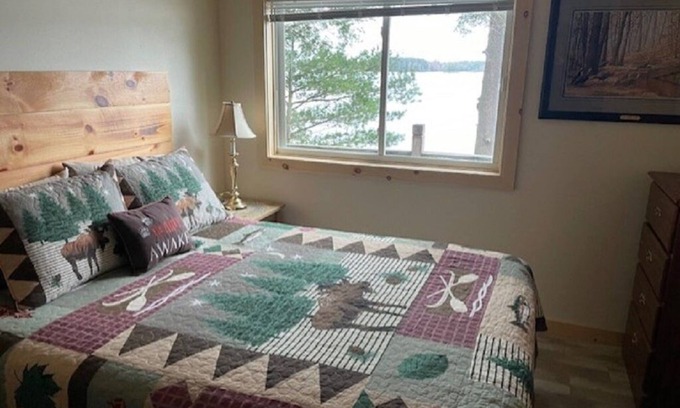 Arbor Vitae Cabin | Charming 2-bedroom cabin 30 feet from the shores of Mid Lake on Minocqua Chain