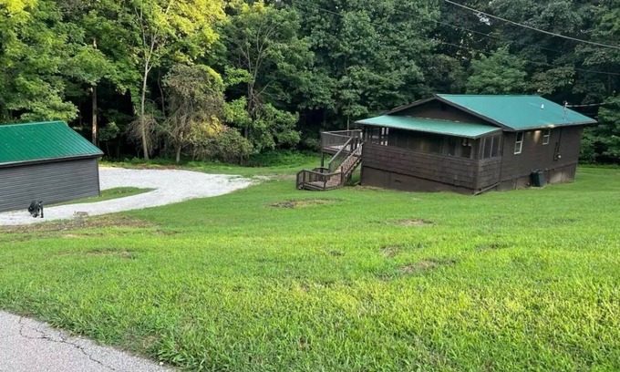 Raceland House | Charming 2-bedroom house located in beautiful wooded setting!
