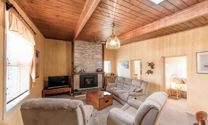 Macgillivray Cottage | Charming and Private Cottage with Fireplace for a Cozy Island Getaway.