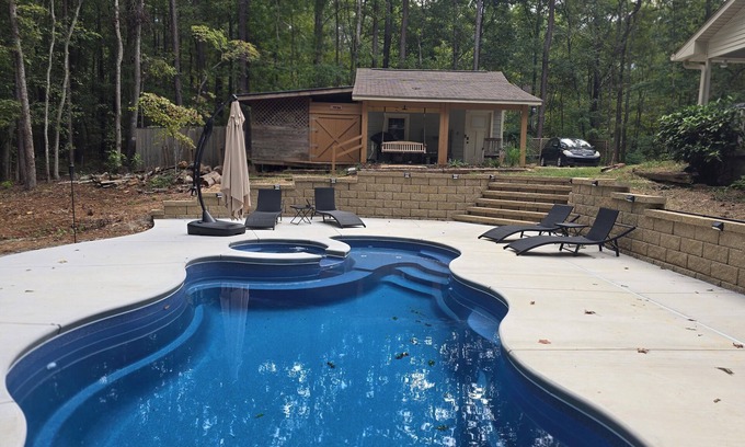 McDonough House | Charming bungalow in peaceful McDonough overlooking Heated Pool and Spa