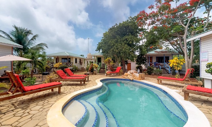 Hopkins Apartment | Charming cabana with a porch, hammock, strong WiFi, and a shared pool & grill