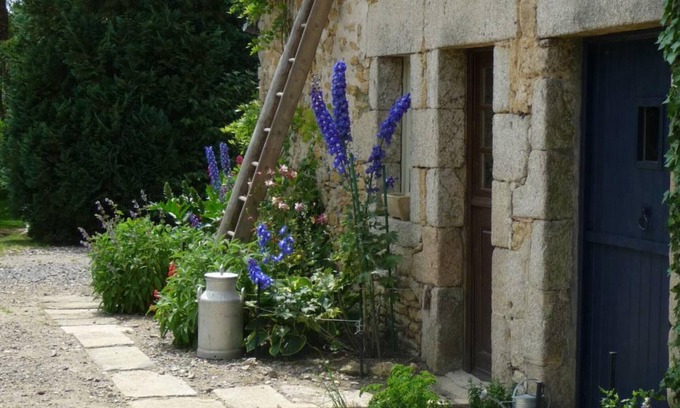 Forges Cottage | Charming Cottage with Garden, Stream, and Modern Amenities near Alençon