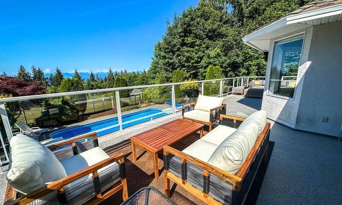Regional District of Nanaimo House | Charming home with a private pool and inviting upper deck patio, perfect for relaxed outdoor living
