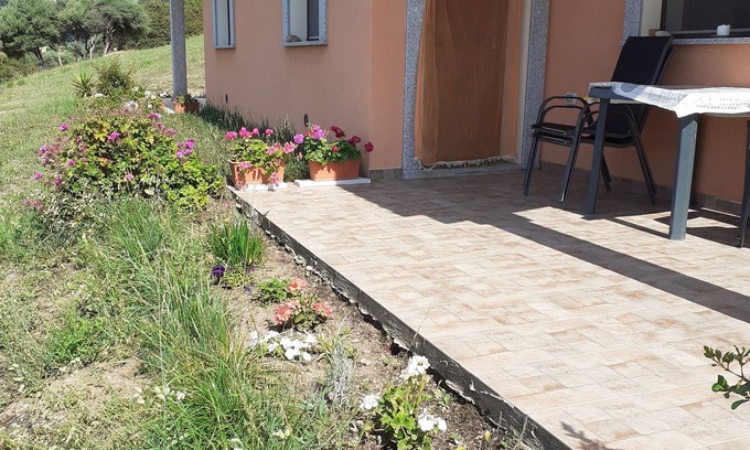 Aglientu Apartment | Charming juniper house with pool -solarium, sea view and lots of nature