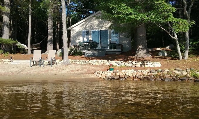 Milton Cottage | Charming lakefront cottage with sandy beach on a large private wooded lot