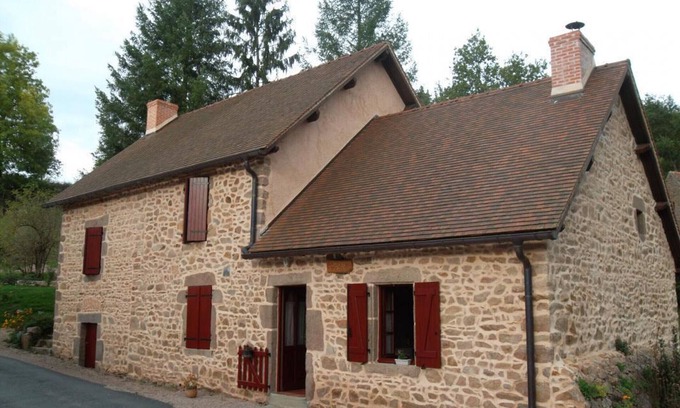 Barrais-Bussolles Cottage | Charming Mill House with Pond, Waterfall, and Family Activities Near Vichy