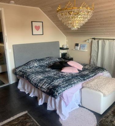 Lulea House | Charming room with big bed
