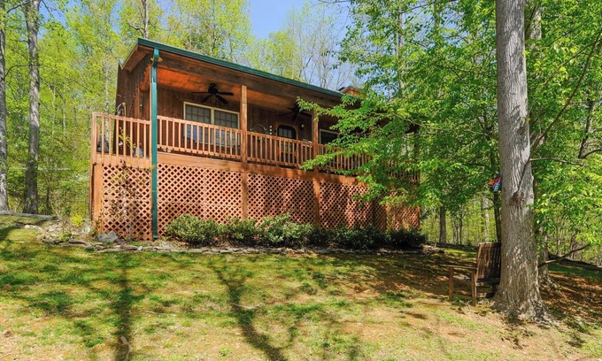 Townsend Cabin | Charming Rustic Cabin. Great covered porch to enjoy during your stay.