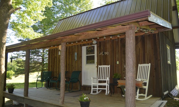 Carlton Cabin | CHASIN' MEMORIES,nCozy, rustic cabin. Close to many boating and fishing lakes.n