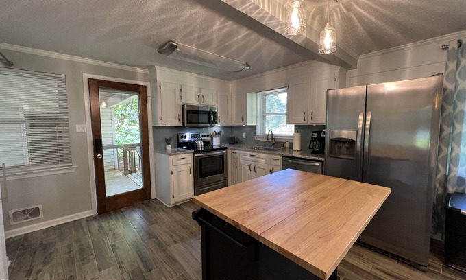 Newton House | Cheerful, relaxing ranch in quiet neighborhood with fire pit