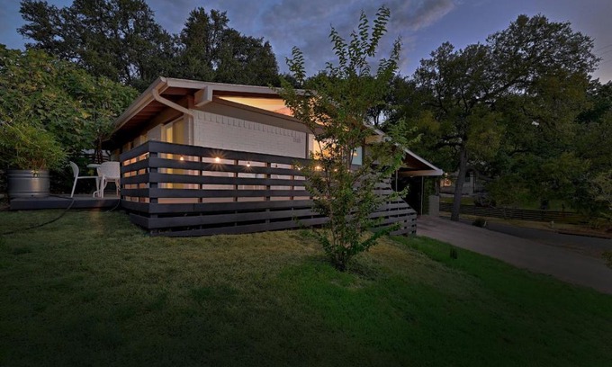 South River City House | Cheery Modern Retreat near SoCo & Downtown by Lodgewell