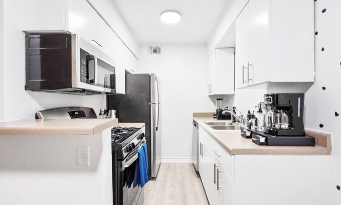 West Campus Apartment | Chic 2BD Entertainer: Arcade & Insta Wall