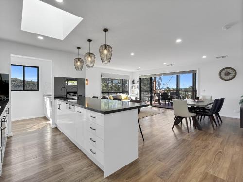 Malua Bay House | Chic 4-Bed with 3 Living Areas & Alfresco Dining