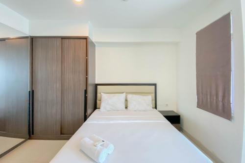 Pekayon Jaya Apartment | Chic and Cozy 2BR Grand Kamala Lagoon Apartment By Travelio