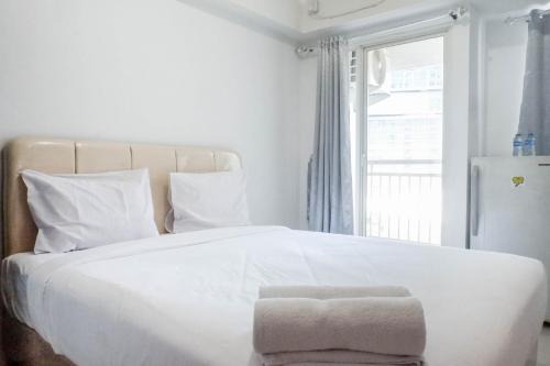 Surabaya Apartment | Chic and Cozy Studio Apartment at Tanglin Supermall Mansion By Travelio
