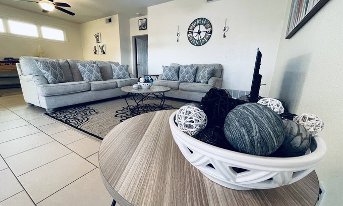 Midland Condo | Chic brick interior condo lit by string lights
