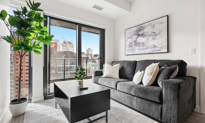 Eau Claire Apartment | City Lights & River Sights 2BR, AC, XL Patio, Gym