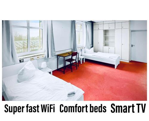 Burbach Apartment | CityChalet Business Apartments - Workers welcome! - Free Parking - Fast WIFI - Smart TV - WM