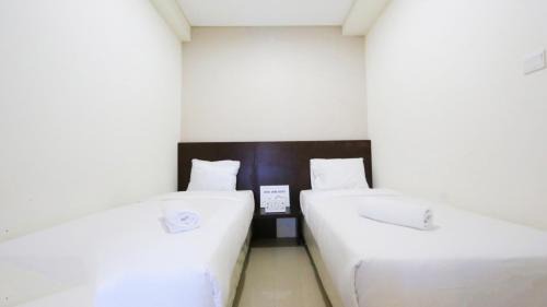 Hegarmanah Apartment | Clean and Cozy 2BR Apartment Parahyangan Residence By Travelio