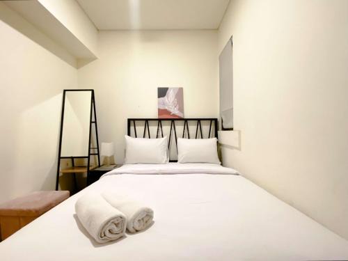 East Jakarta Apartment | Clean and Homey 2BR at Meikarta Apartment By Travelio