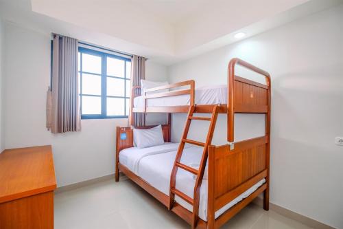 Pondokcina Apartment | Comfort 1BR at Evenciio Margonda Apartment By Travelio