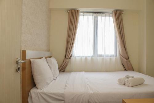 Cikarang Apartment | Comfort and Nice 2BR at Meikarta Apartment By Travelio