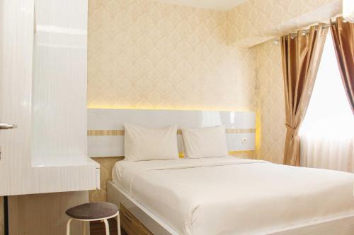 Karawang Apartment | Comfort Living 1BR at Grand Sentraland Karawang Apartment By Travelio