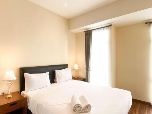 Cikarang Apartment | Comfortable and Strategic 1BR at Vasanta Innopark Apartment By Travelio