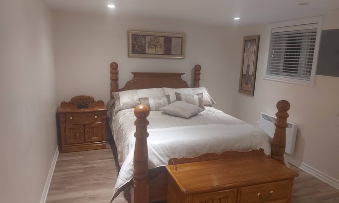 Laval-des-Rapides Apartment | Comfortable apartment, half basement and 3 min walk from Concorde metro station