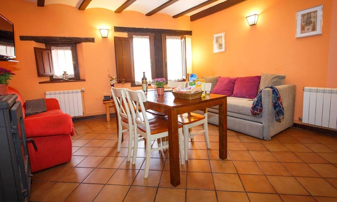 Robregordo Apartment | Comfortable bedroom apartment and sofa bed on the ground floor with fireplace