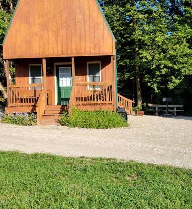 Moscow House | Comfortable Camping Cabins with View of the Cedar River for a Family Weekend Getaway
