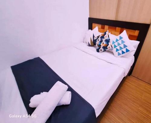 Ususan Apartment | Comfy 1BR with Pool View and Wi-Fi in Grace Res Taguig City