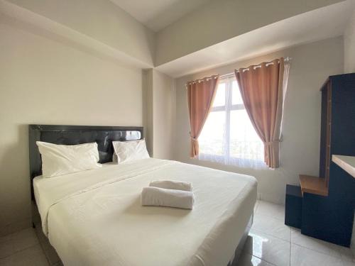 Bandung Apartment | Comfy 2BR Apartment at Newton Residence near Tol Buah Batu By Travelio