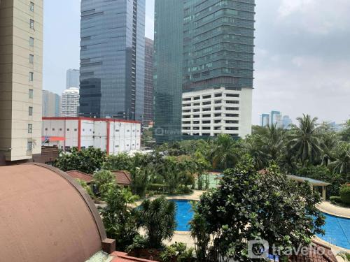 Semanggi Apartment | Comfy and Elegant 2BR at Sudirman Tower Condominium Apartment By Travelio